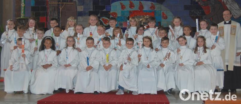Ein Erinnerungsbild mit &quot;Ewigkeitswert&quot;. Zum ersten Mal dürfen die Kommunionkinder gemeinsam mit Jesus das heilige Mahl halten. 	Bild: az
