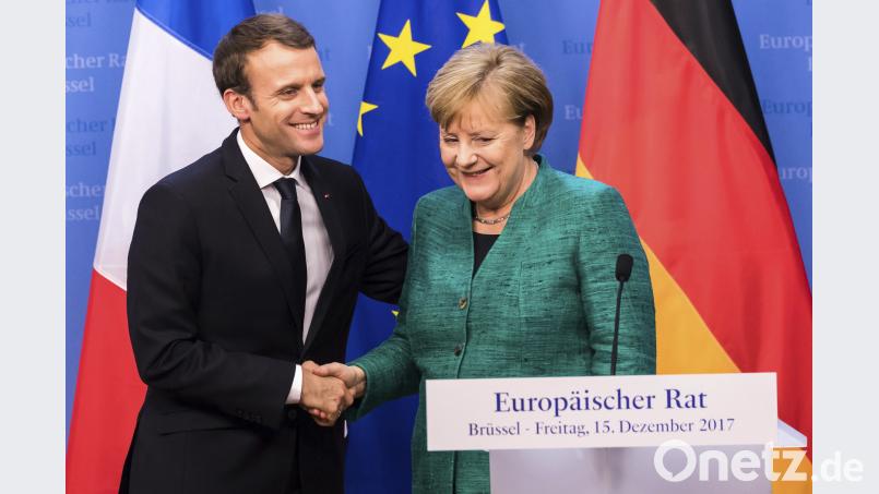 Bundeskanzlerin Angela Merkel (CDU) und der französische  Präsident Emmanuel Macron. Vanden Wijngaert/AP/dpa