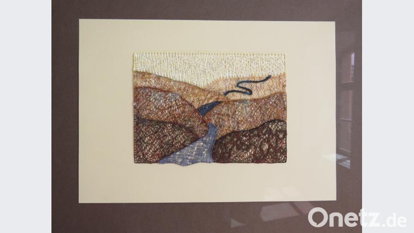 Erst beim genauen Betrachten wird auf diesem "Gemälde" sichtbar, dass es sich um eine Klöppelarbeit handelt. ubb