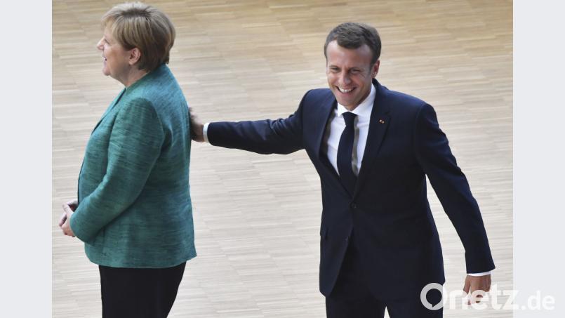 Der französische Präsident Emmanuel Macron und Bundeskanzlerin Angela Merkel bei der Ankunft zum EU Gipfel. Geert Vanden Wijngaert, dpa