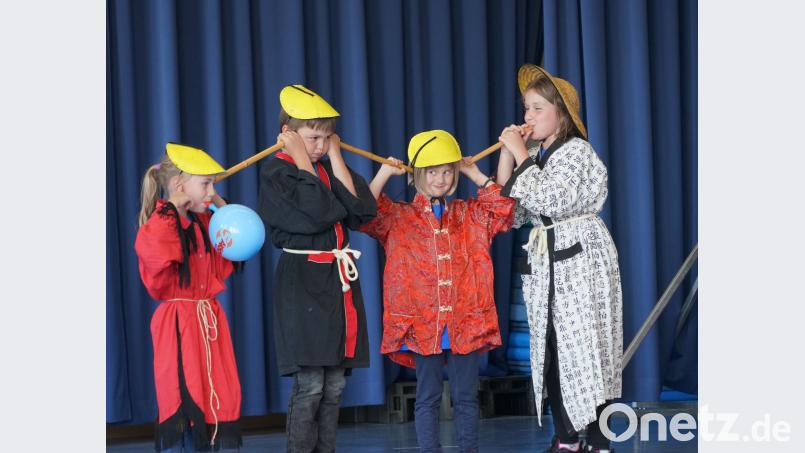 Vier Chinesen treten ohne Kontrabass auf. fvo