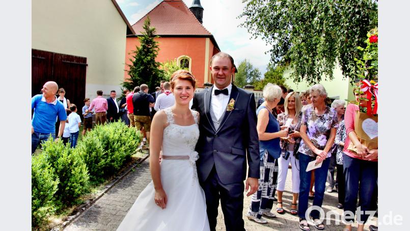 Melanie und Jürgen Herrmann nach der Trauung in der St.-Ulrichskirche . ds