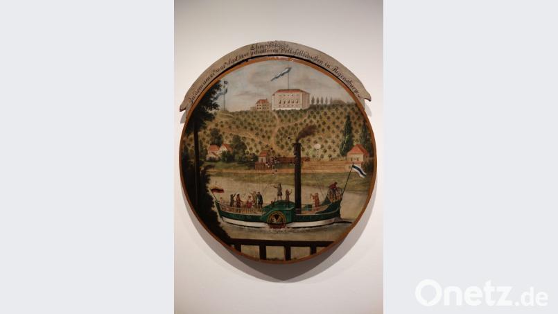 Eine Schützenscheibe aus dem Jahr 1840 zeigt die Regensburger Seidenplantage mit einem Dampfschiff im Vordergrund. Bild: Susanne Wolke