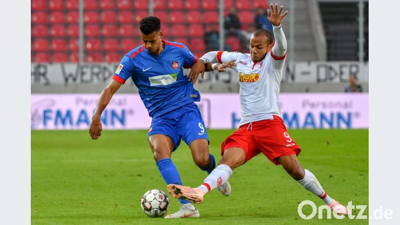 Der SSV Jahn Regensburg (rechts im Bild Jann George) lieferte sich am Mittwochabend mitunter einen wilden Ritt mit dem 1. FC Heidenheim um Torschütze Robert Glatzel. Bild: agentur_dpa