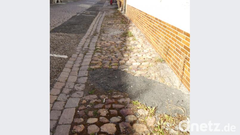 In der Postgasse soll nach den Plänen der CSU-Fraktion das Pflaster samt Katzenköpfen beseitigt werden. Bild: u