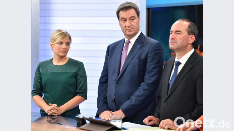 Die bayerische Spitzenkandidatin (von links) Katharina Schulze von Bündnis 90/Die Grünen, Markus Söder (CSU) und Hubert Aiwanger (Freie Wähler). Bild: Lukas Barth-Tuttas/dpa