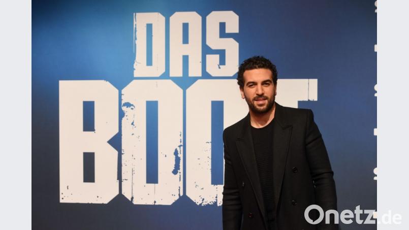 Der jüngste Coup von Sky: Ab 23. November startet exklusiv die Serie "Das Boot" (Sky-Werbefigur Elyas M'Barek bei der "Das Boot"-Weltpremiere am Dienstagabend). In Regensburg muss sich jetzt eine Gruppierung verantworten, der vorgeworfen wird, tausenden Kunden Zugänge ohne Abo verschafft zu haben. Bild: Tobias Hase/dpa
