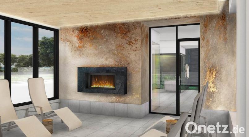 Der Ruhe-Bereich strahlt durch einen Elektro-Kamin nochmal zusätzlich Gemütlichkeit und Wärme aus. Bild: Bauconzept/exb