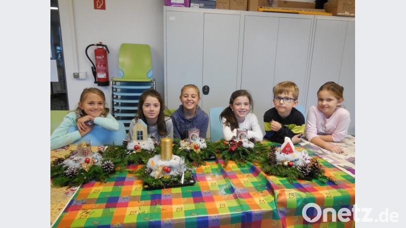 Kinder beim Basteln. Bild: exb