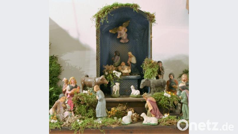 In modernen Krippenszenerien – wie hier in einer Krippenausstellung in Prag – sind Maria und Josef sowie Ochs und Esel zu finden. Die frühen Christen beschränkten sich auf die beiden Tiere. Bild: Rainer Christoph