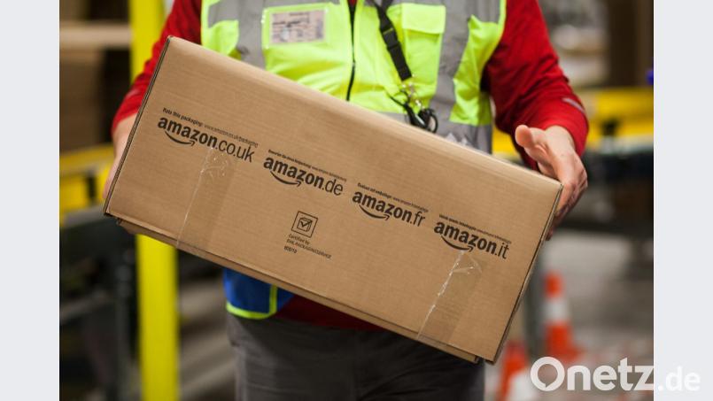 Kunden erhalten derzeit ungewollt Amazon-Pakete. Doch von Amazon selbst kommen sie gar nicht. Bild: Christoph Schmidt/dpa