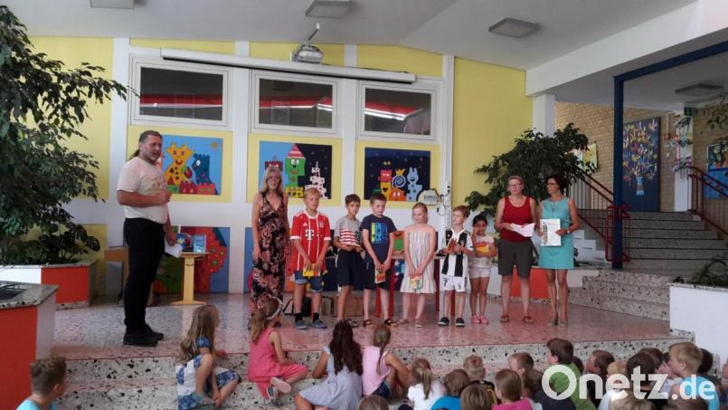 Die Kinder hörten aufmerksam zu, wofür ihre Spenden verwendet werden. Bild: exb