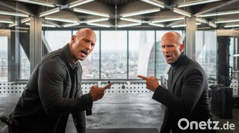 Dwayne Johnson (links) als Secret-Service-Agent Luke Hobbs und Jason Statham als Ex-Elitesoldat Deckard Shaw in "Fast & Furious: Hobbs & Shaw". Bild: Universal Pictures/dpa