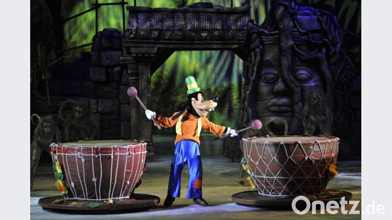 Goofy, Disneys größter Tollpatsch, spielt auf Trommeln. Bild: Adam Warzawa/ dpa