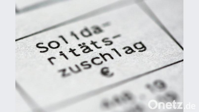 Union und SPD haben wollen den Solidaritätszuschlag für die allermeisten Steuerzahler abschaffen. Bild: Roland Weihrauch