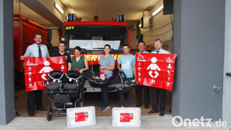 Gleich zwei Luher Feuerwehrmänner genießen Zwillingsfreuden. Bild: mld