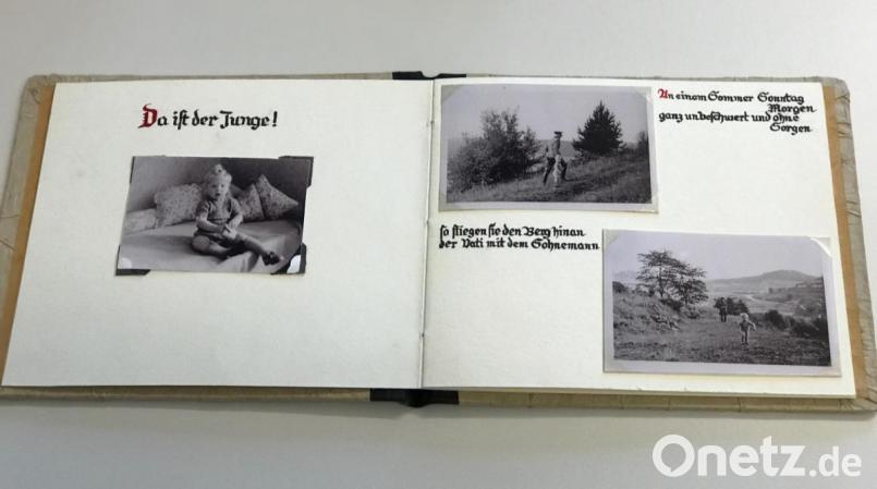 Die Reproduktion des Fotoalbums eines SS-Mannes, der hier den Spaziergang mit seinem Sohn dokumentiert. Bild: eig