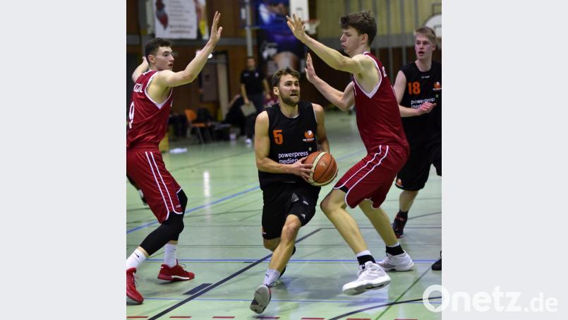 Tobias Merkl (Mitte) traut den deutschen Basketballern bei der WM in China sogar den Titel zu. Bild: A. Schwarzmeier