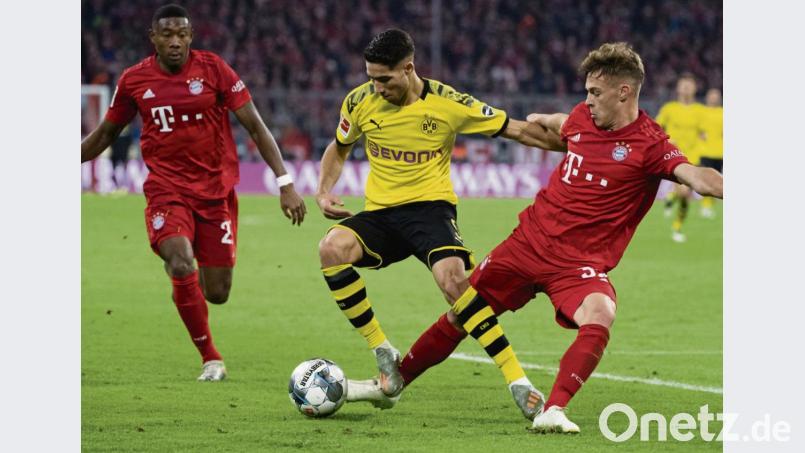 Die Dortmunder hatten am Samstagabend in München nicht nur kaum eine Torchance, sie zogen auch in den Zweikämpfen zumeist den Kürzeren. In dieser Szene hat Achraf Hakimi (Mitte) gegen Joshua Kimmich (rechts) und David Alaba das Nachsehen. Bild: agentur_dpa