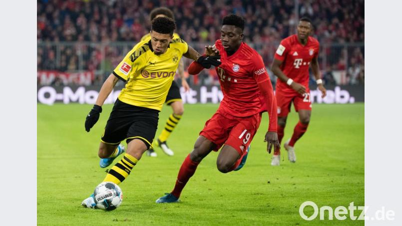 Dortmund Jadon Sancho (links) konnte sich kaum gegen Bayerns Not-Außenverteidiger Alphonso Davies durchsetzen. Bild: Matthias Balk/dpa