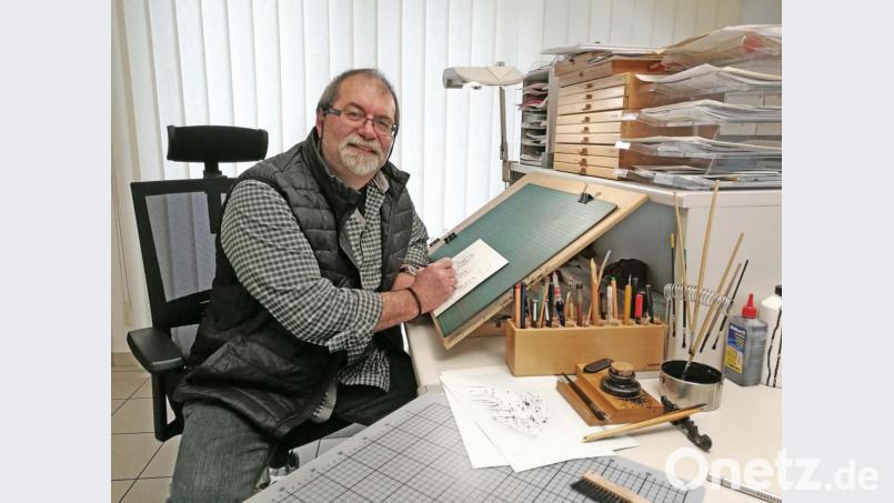 Karikaturist Jürgen Tomicek in seinem Atelier in Werl (Nordrhein-Westfalen). Bild: exb