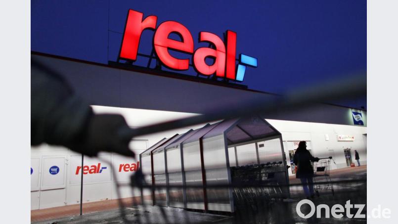 Steht die Supermarktkette mit 276 Real-Märkten und 34.000 Beschäftigten vor der Zerschlagung. Foto: Oliver Berg/dpa Bild: Oliver Berg
