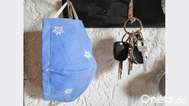 Handy, Geldbeutel, Schlüssel, Mundschutz - viele gehen nicht mehr ohne aus dem Haus. Bild: anv