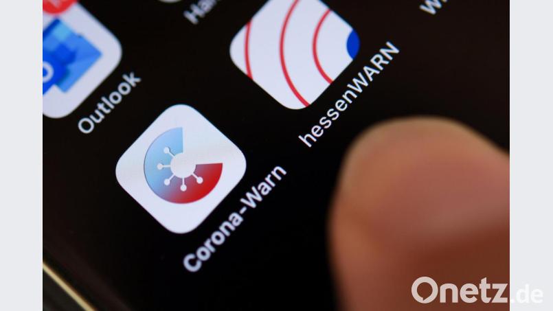 Technische Probleme mit der Corona-Warn-App treten auch bei iPhones auf. Foto: Arne Dedert/dpa Bild: Arne Dedert