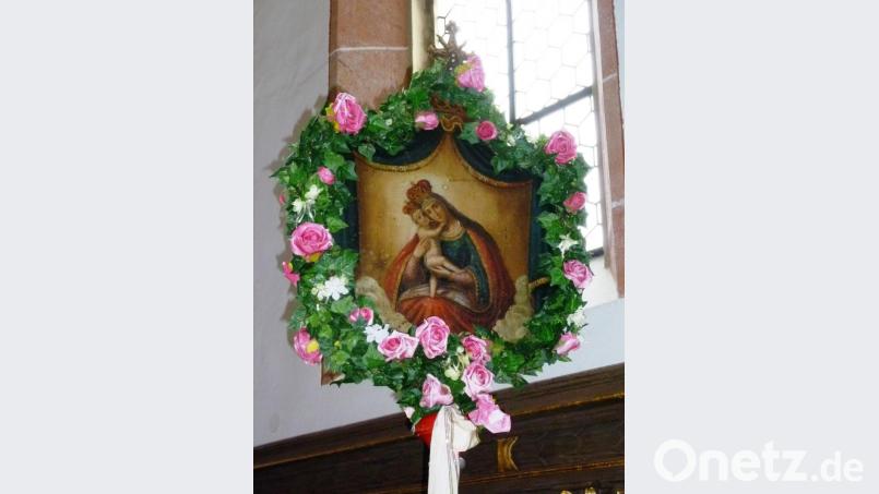 Eine Kopie des Mariahilfbildes, wie sie auch in der Bergkirche in Eschenbach zu sehen ist, ziert die Vorderseite des Wallfahrerbildes. Bild: hev