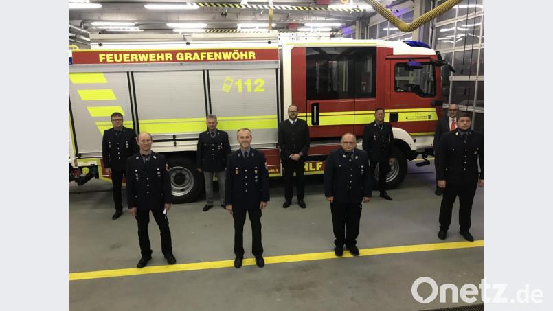 Die Feuerwehr aus Schlammersdorf empfing gleich acht Ehrenzeichen in Gold. Bild: sne