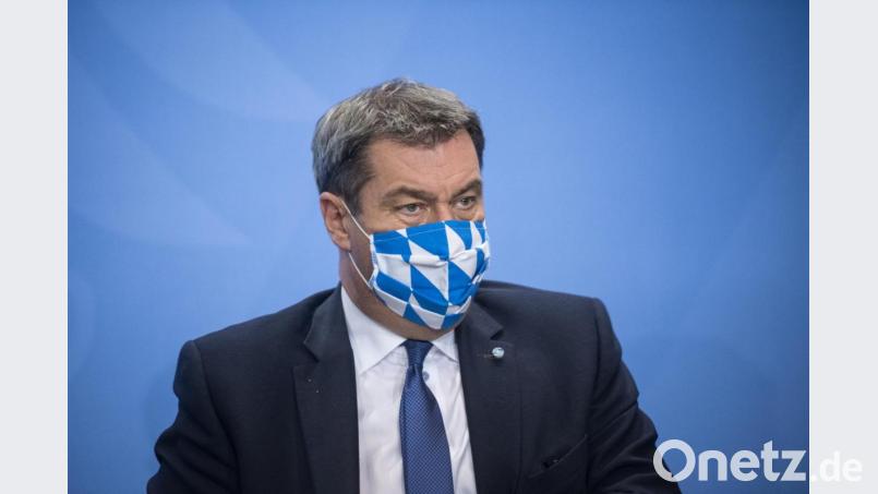 Markus Söder geht auf Distanz zu dem bundesweit umstrittenen Beherbergungsverbot für Urlauber aus Corona-Hotspots. Bild: Stefanie Loos/AFP POOL/dpa