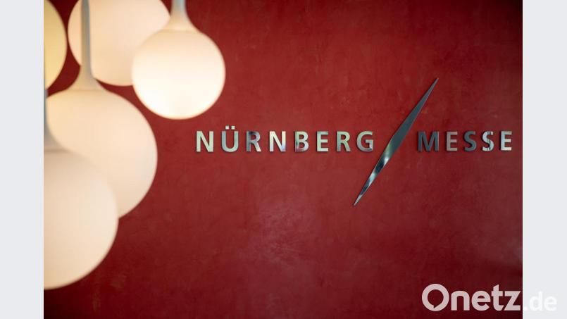 Das Logo der Nürnberg Messe GmbH. Archivbild: Daniel Karmann/dpa