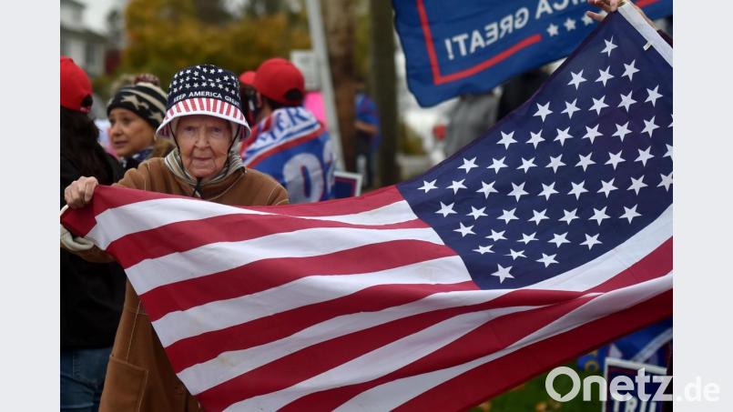 Die Präsidentschaftswahl in Amerika hat die Spaltung der US-Gesellschaft weiter vertieft. Das Foto zeigt eine Seniorin, die sich mit einem Keep-America-Great-Hut als Trump-Anhängerin zu erkennen gibt. Bild: Aimee Dilger/SOPA Images via ZUMA Wire/dpa
