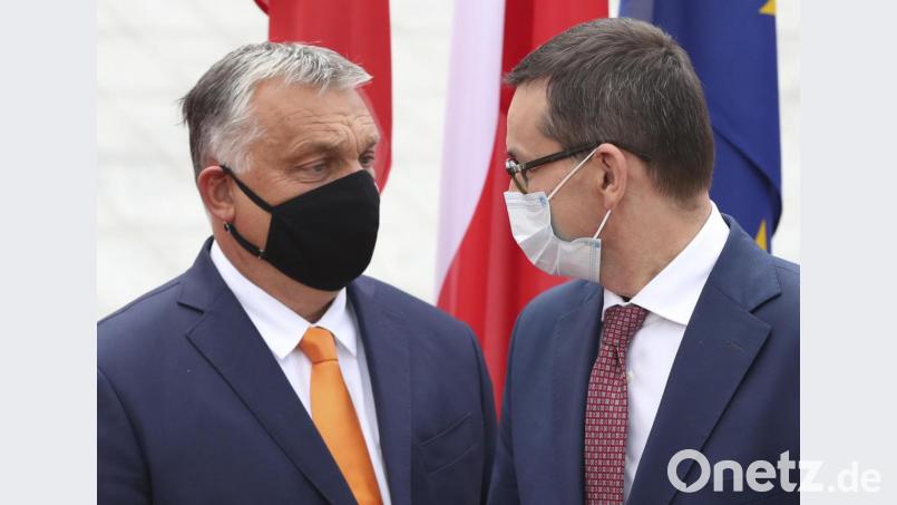 der ungarische Premier Viktor Orban (links) und sein polnischer Amtskollege Mateusz Morawiecki. Bild: Czarek Sokolowski/AP/dpa