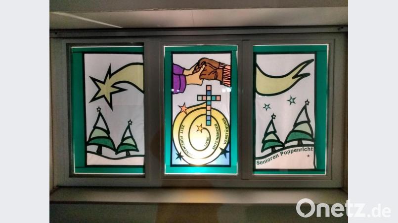 Das Fenster hat der Seniorenkreis für „St. Michael leuchtet“ gestaltet. Bild: Regina Probst/exb