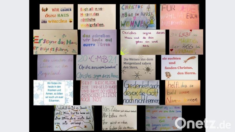Unter Anleitung von Glowka hatten die Ministrantinnen und Ministranten ihre Gedanekn zum Fest aufg einem Boten Papier ausgedruckt, den sie den Gläubigen mit auf den Weg gaben. Bild: ld