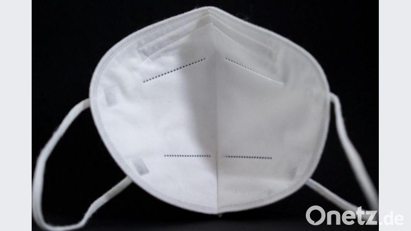 Die Aufnahme zeigt eine FFP2-Maske. Foto: Daniel Karmann/dpa/Illustration Bild: Daniel Karmann