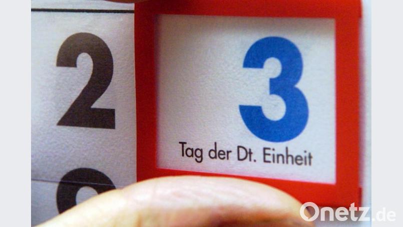 In diesem Jahr fallen ungewöhnlich viele Feiertage auf ein Wochenende. Unter anderem der Tag der Deutschen Einheit. Bild: Peer Grimm/dpa