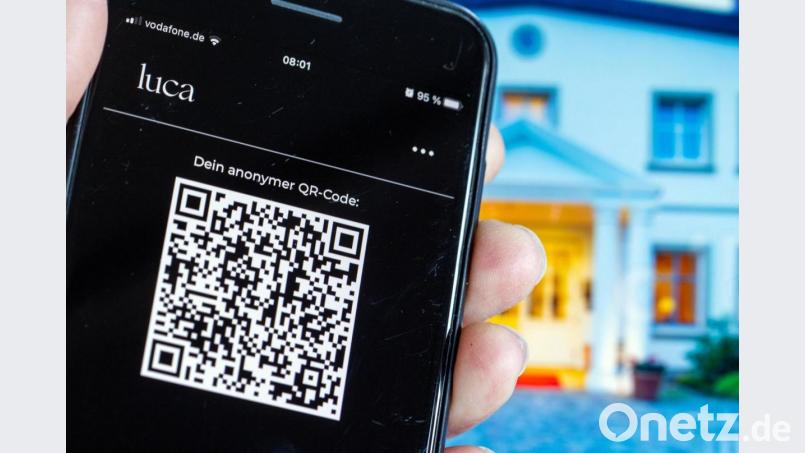 Die Luca App soll verschlüsselte Kontaktdatenübermittlung für Gastgeber und ihre Gäste ermöglichen. Symbolbild: Jens Büttner/dpa