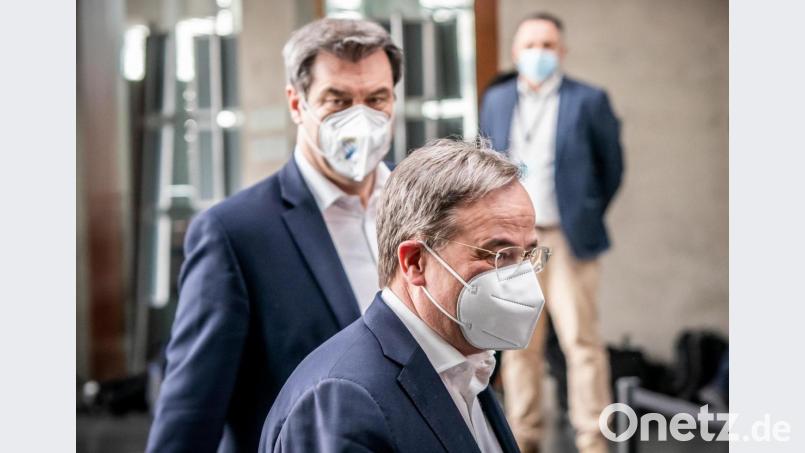 Markus Söder und Armin Laschet am Sonntag vor der Pressekonferenz bei der Klausurtagung des Geschäftsführenden Vorstands der Unionsfraktion im Bundestag. Bild: Michael Kappeler/dpa