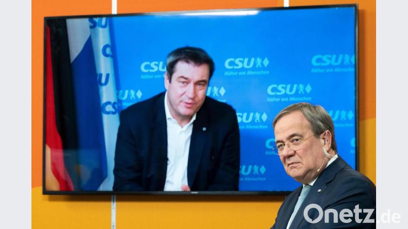 Wer wird Kanzlerkandidat der Union, Armin Laschet, Ministerpräsident von Nordrhein-Westfalen, oder der bayerische Ministerpräsident Markus Söder (links)? Archivbild: Federico Gambarini