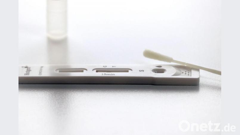 Die Testkassette eines Corona-Schnelltests (Antigentest) liegt auf einem Tisch. Bild: Karl-Josef Hildenbrand/dpa