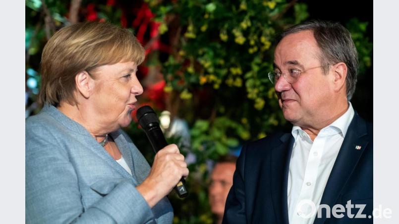Bundeskanzlerin Angela Merkel und Unions-Kanzlerkandidat Armin Laschet im Gespräch. Symbolbild: Bernd von Jutrczenka