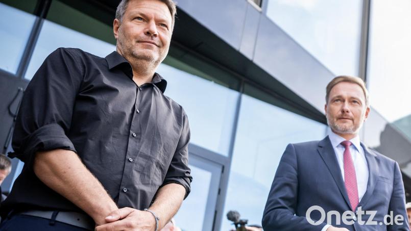 Robert Habeck (links) und Christian Lindner - beide werden als künftiger Finanzminister gehandelt. Archivbild: Michael Kappeler/dpa