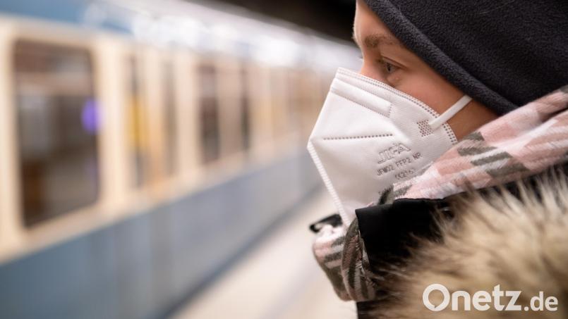 Ein Frau mit FFP2-Maske. Künftig gilt in Bayern auch bei 2G Maskenpflicht. Bild: Sven Hoppe/dpa