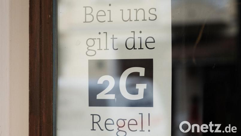 In Bayern gilt ab Mittwoch fast flächendeckend die 2G-Regel. Ausnahme ist der Handel. Symbolbild: Christophe Gateau/dpa