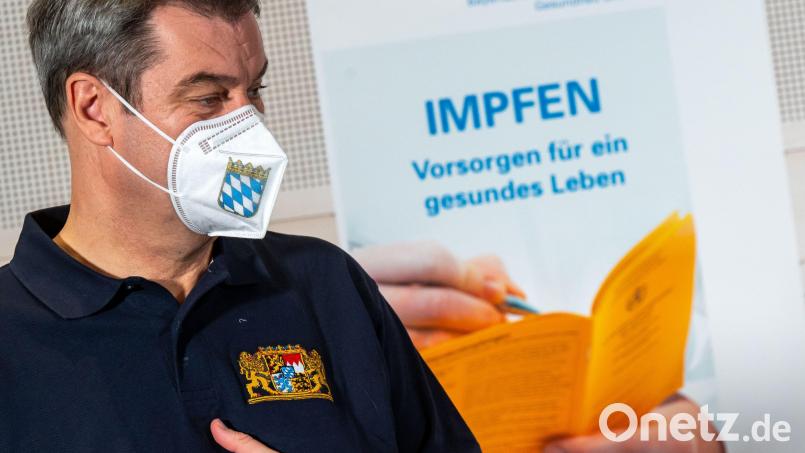 Bayerns Ministerpräsident Markus Söder steht nach seiner Impfung vor einem Impf-Plakat. Foto: Peter Kneffel/dpa/Archiv Bild: Peter Kneffel
