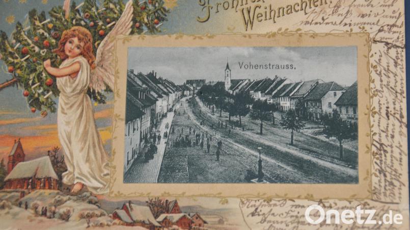 Eine alte Ansicht aus Vohenstrauß in Begleitung des Christkinds, das den weihnachtlichen Segen Anfang 1900 über das Land bringt. Repro: doj