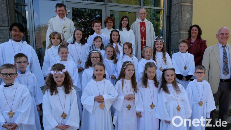 Einen großen Festtag erlebten 21 Kinder, die am Sonntag in der Pfarrkirche St. Johannes der Täufer an den Tisch des Herrn traten. Bild: le