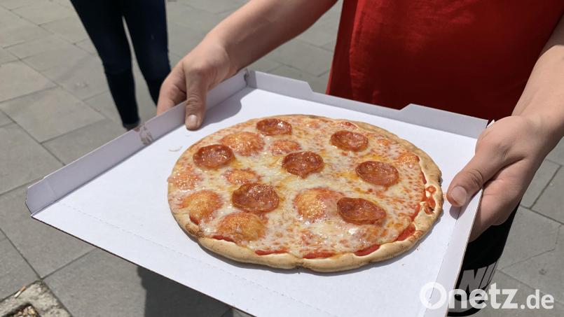 In Kümmersbruck gab es für einen Pizzaboten einen Schlag ins Gesicht. Jetzt ermittelt die Polizei wegen Körperverletzung. Symbolbild: Johannes Neudecker/dpa
